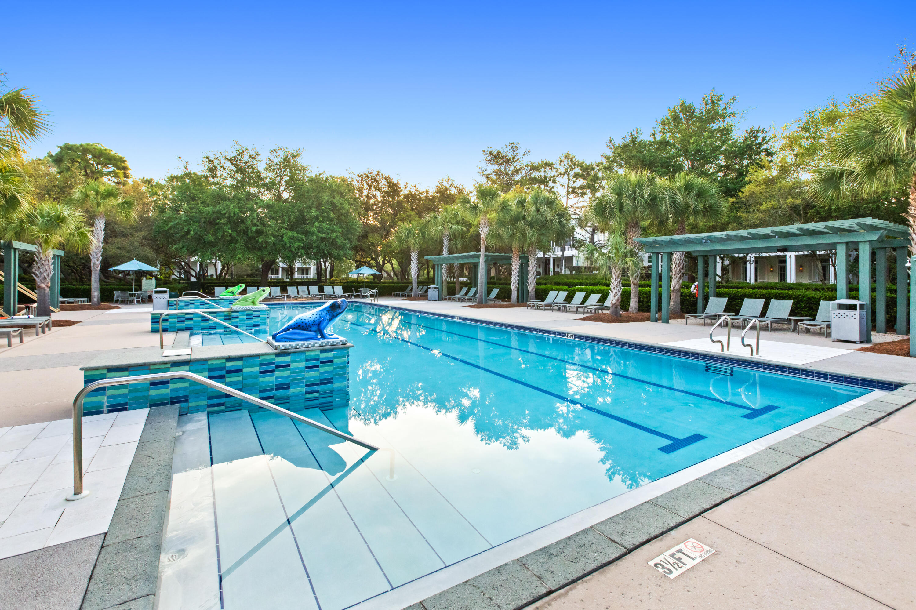 1660 East County Highway 30A, Unit 101 Santa Rosa Beach, FL 32459 - Photo 60 of 67 a view of a swimming pool with chairs