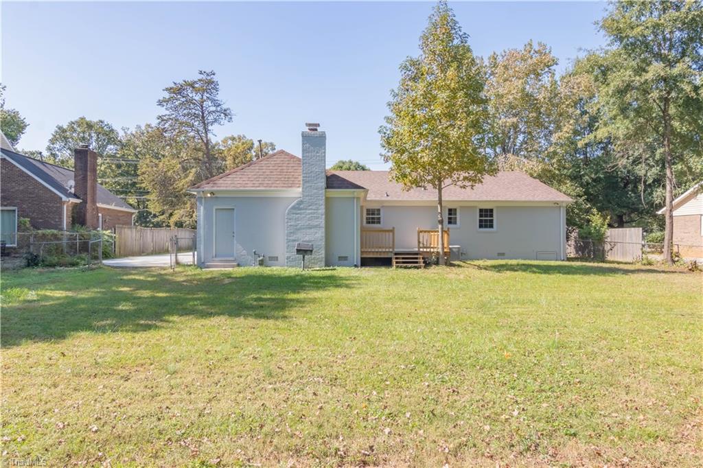 3206 Dillon Road Jamestown, NC 27282 - Photo 2 of 30 Showcasing the back of the house with brand new deck and newly painted exterior.