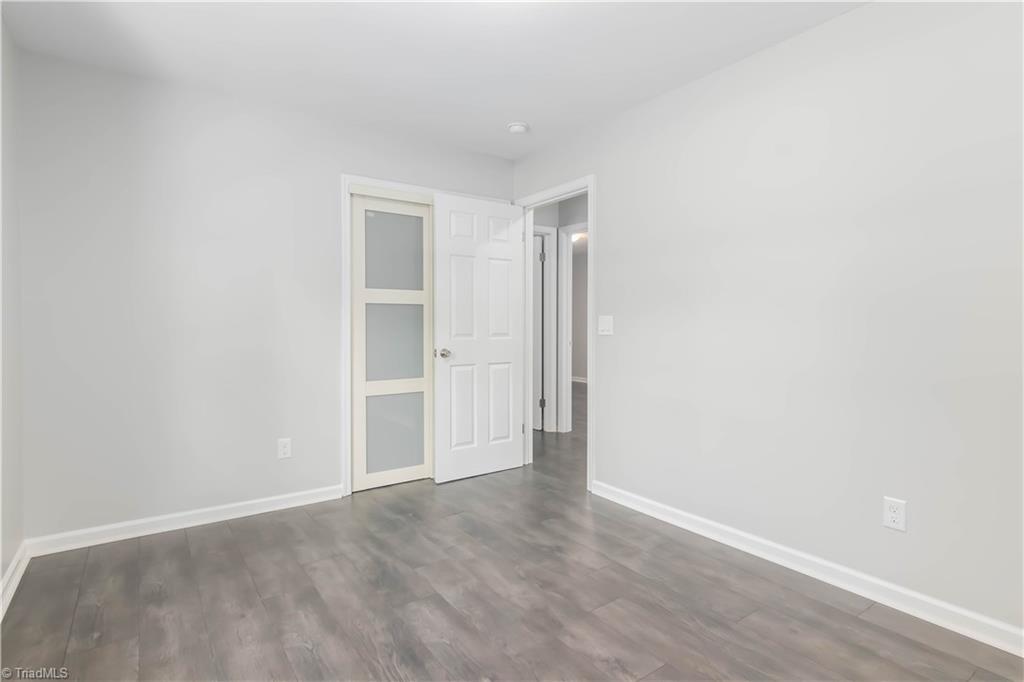 3206 Dillon Road Jamestown, NC 27282 - Photo 19 of 30 Guest bedroom with sliding closet door
