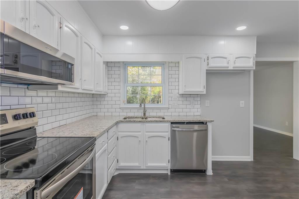 3206 Dillon Road Jamestown, NC 27282 - Photo 3 of 30 Newly remodeled kitchen with all stainless steel appliances