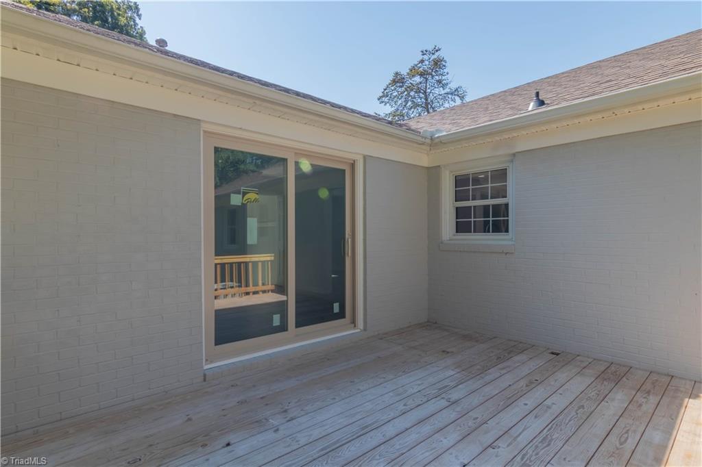 3206 Dillon Road Jamestown, NC 27282 - Photo 25 of 30 New back deck facing inwards toward den