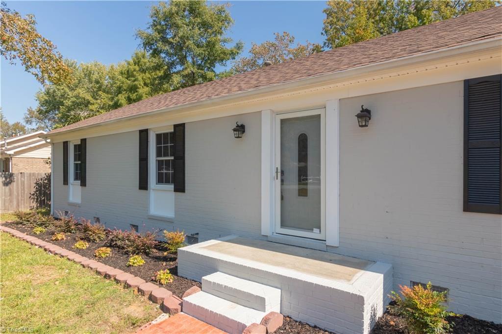 3206 Dillon Road Jamestown, NC 27282 - Photo 30 of 30 Fresh flower beds and newly painted front porch.
