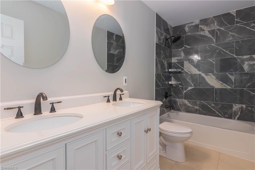 3206 Dillon Road Jamestown, NC 27282 - Photo 4 of 30 Fully new master bathroom with dual sinks
