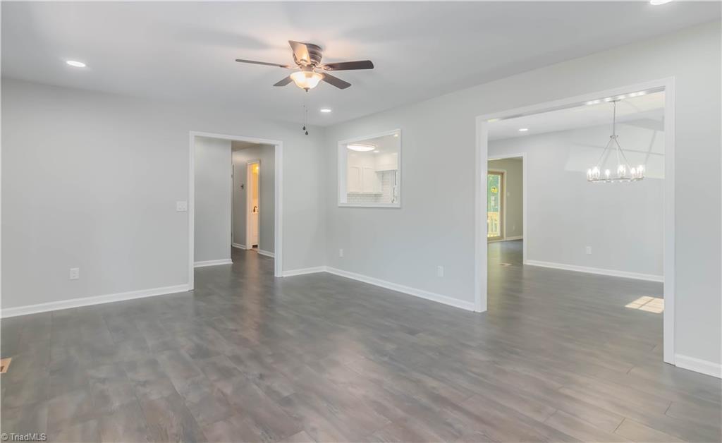 3206 Dillon Road Jamestown, NC 27282 - Photo 9 of 30 Living room looking into dining room