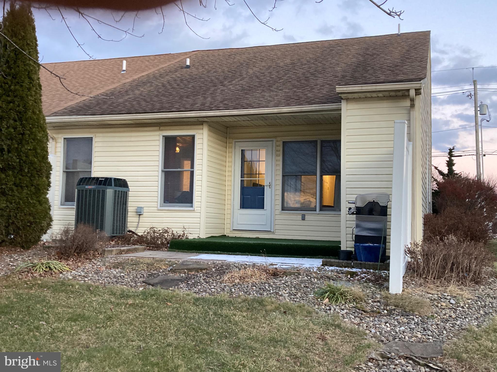 1213 Progress Road Chambersburg, PA 17201 - Photo 3 of 17 Back porch with enclosed storage.
