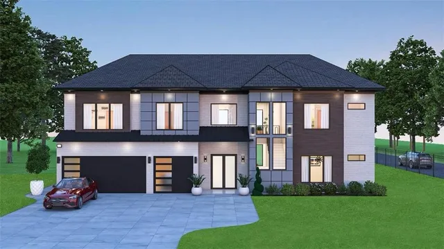 a front view of a house with a garden and yard