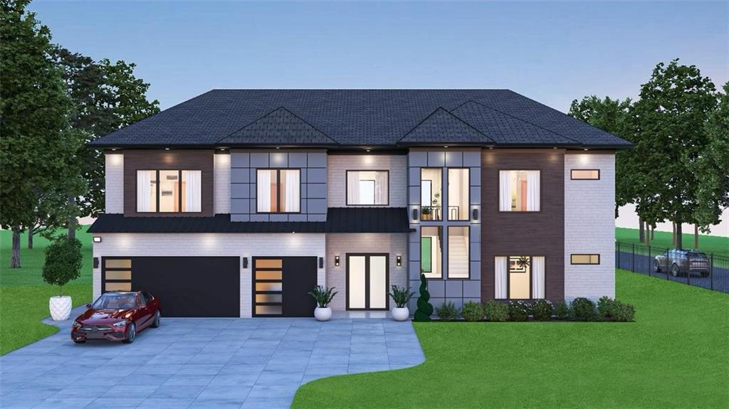 a front view of a house with a garden and yard