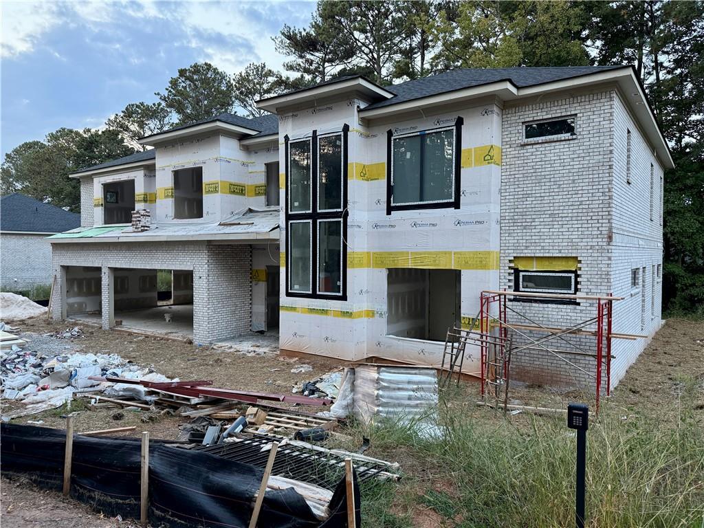 2695 Collins Hill Road Lawrenceville, GA 30043 - Photo 3 of 66 a backyard of a house with seating space