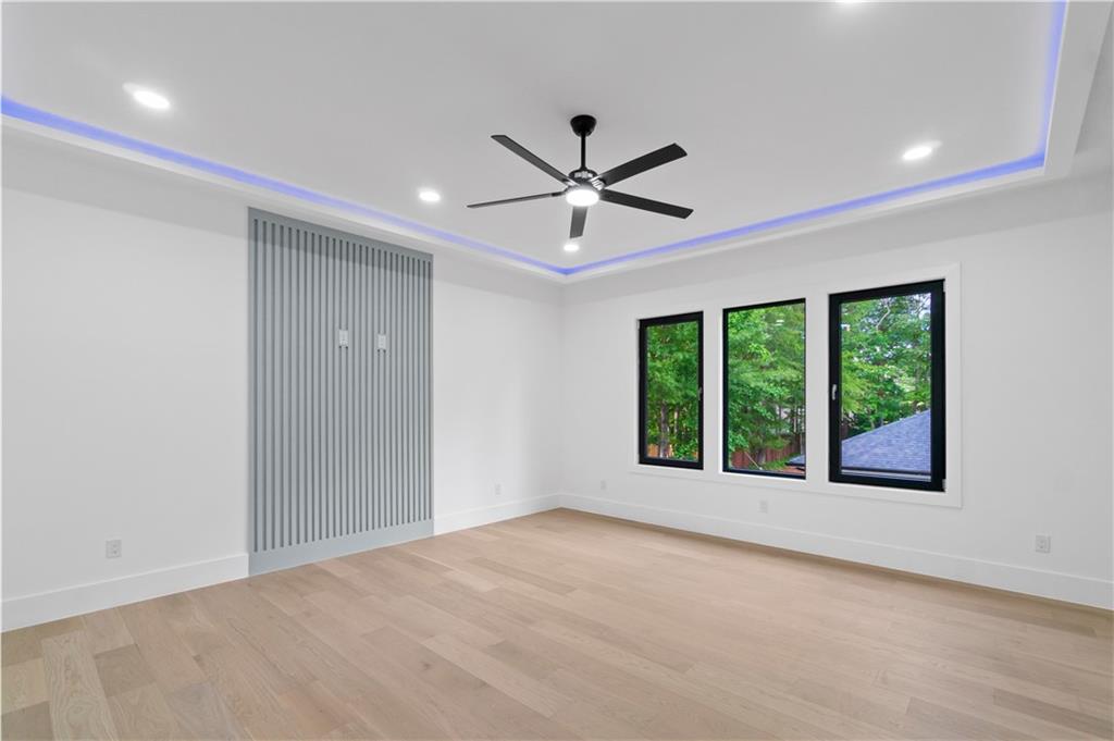 2695 Collins Hill Road Lawrenceville, GA 30043 - Photo 50 of 66 a view of a livingroom with a ceiling fan and window