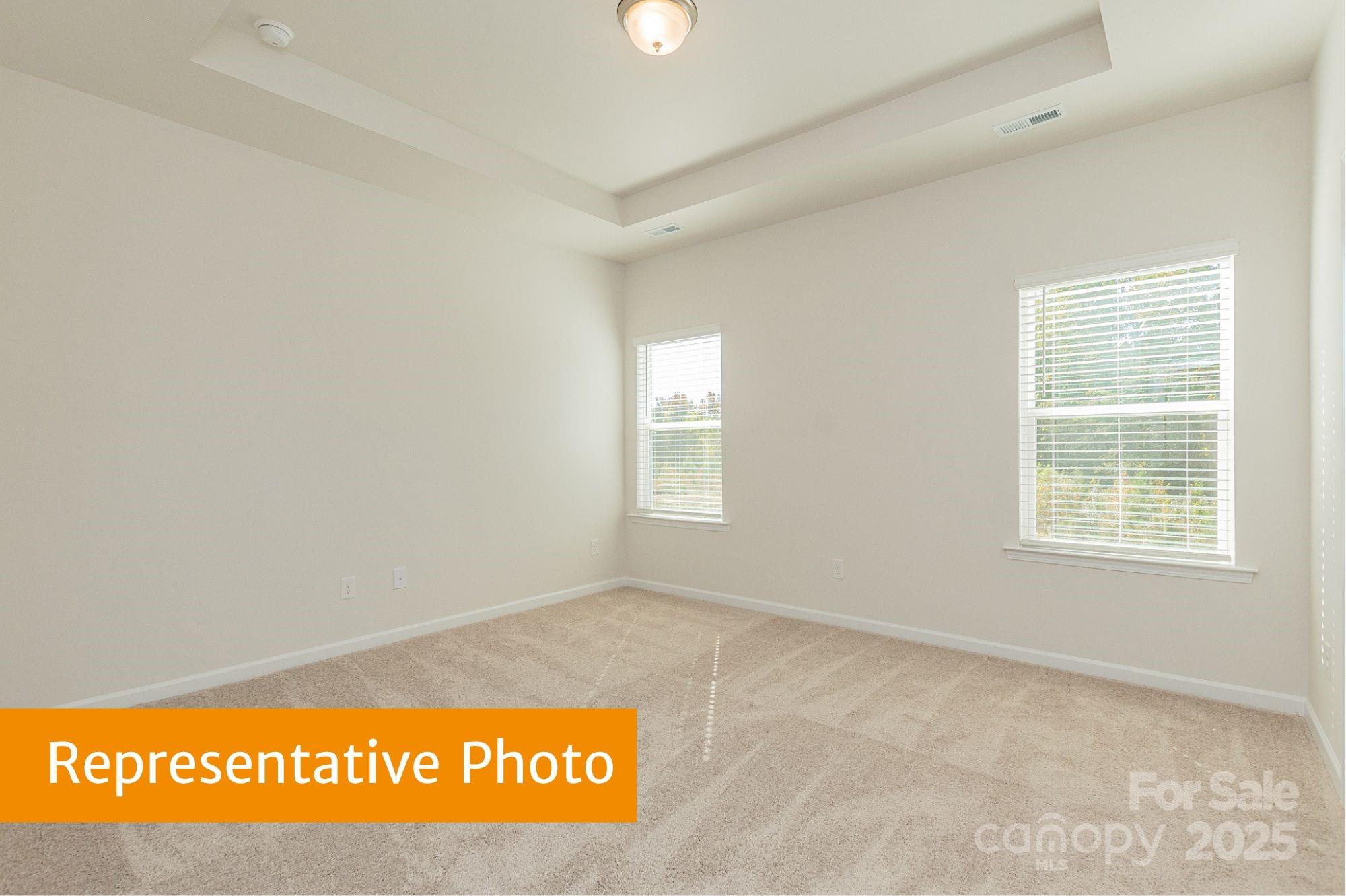 6037 Jasmine Br Road Charlotte, NC 28216 - Photo 20 of 33 a view of an empty room with a window
