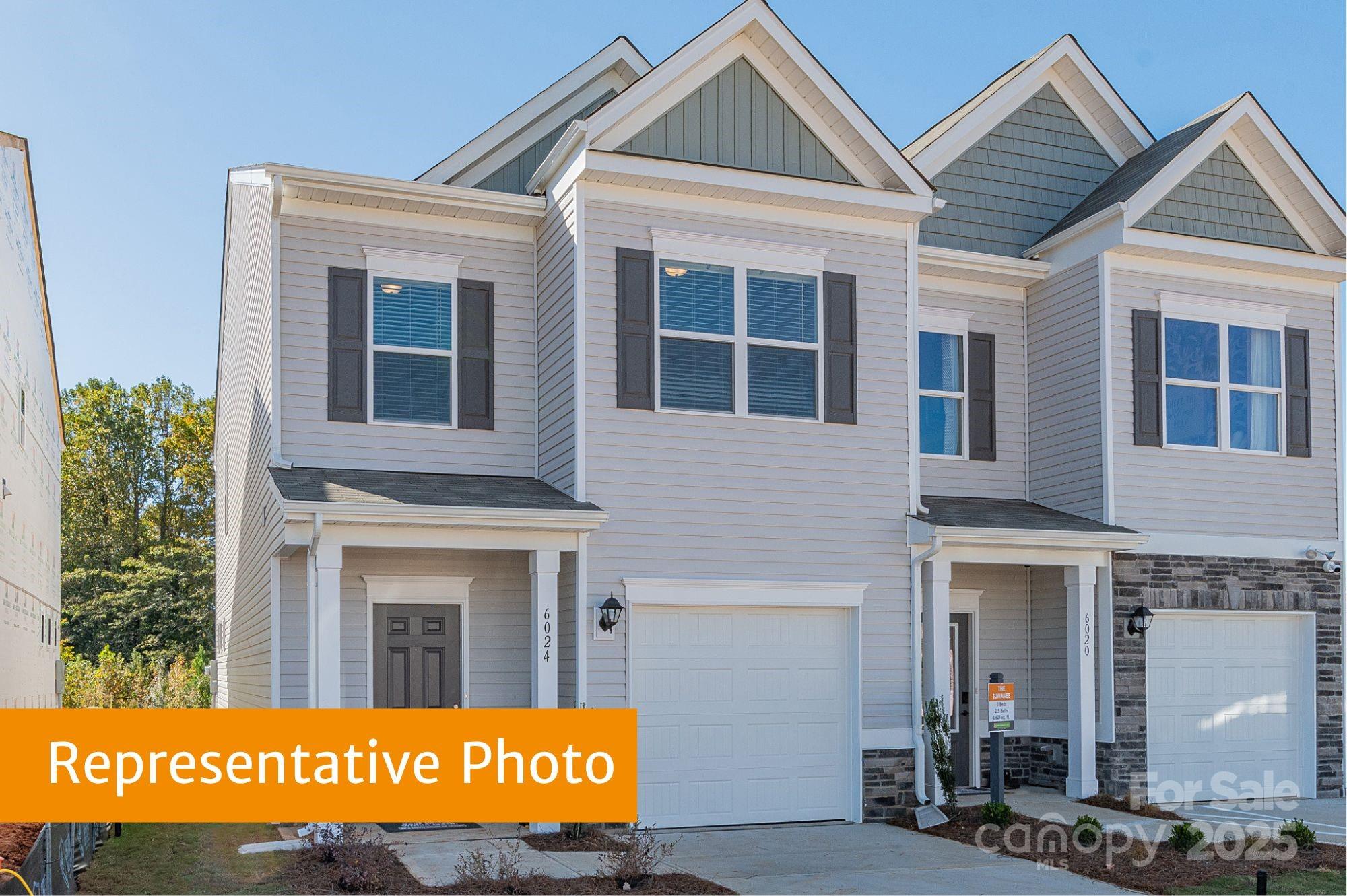 6037 Jasmine Br Road Charlotte, NC 28216 - Photo 3 of 33 a view of the door of the house