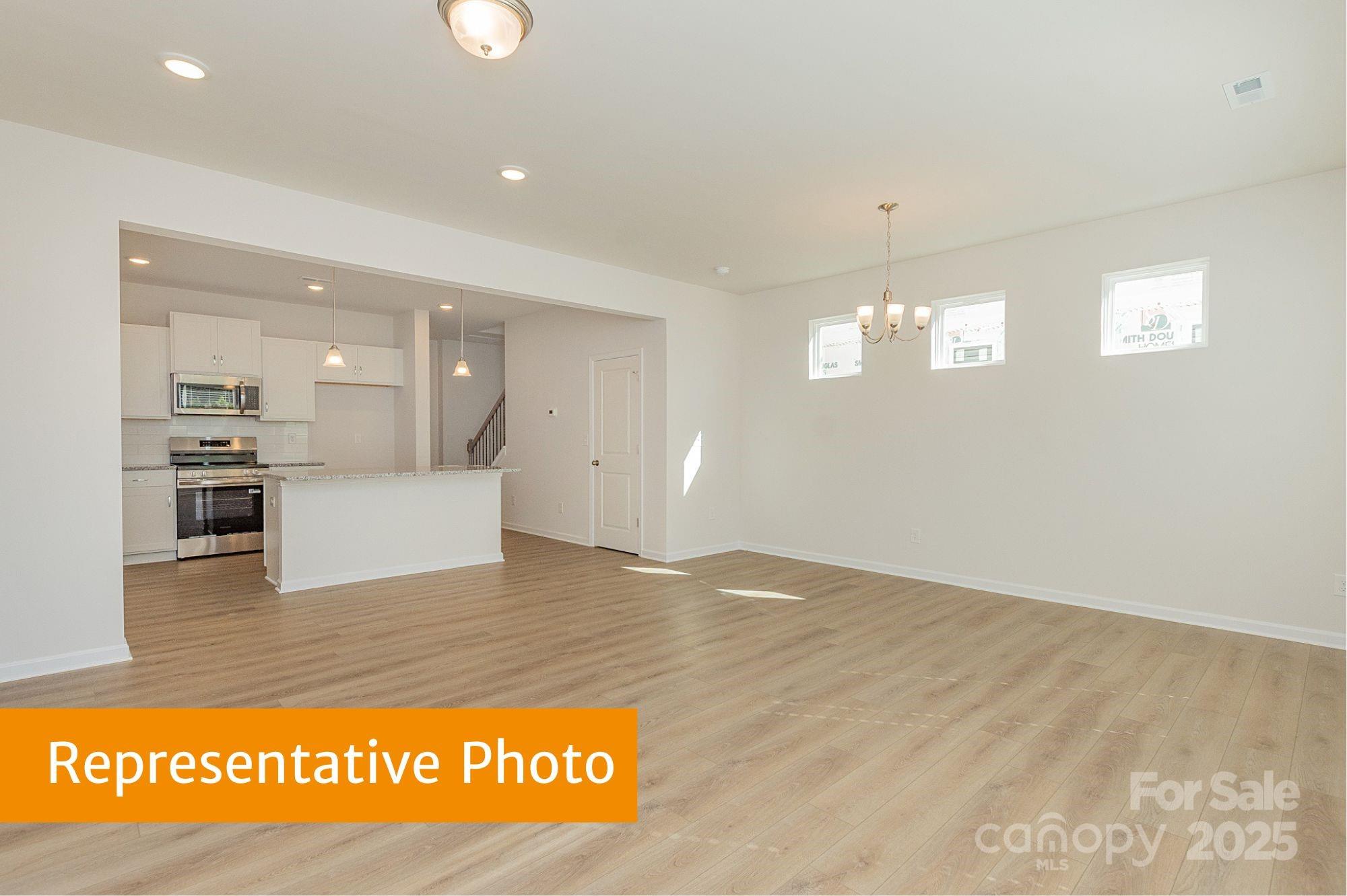 6037 Jasmine Br Road Charlotte, NC 28216 - Photo 10 of 33 a view of kitchen cabinet and window