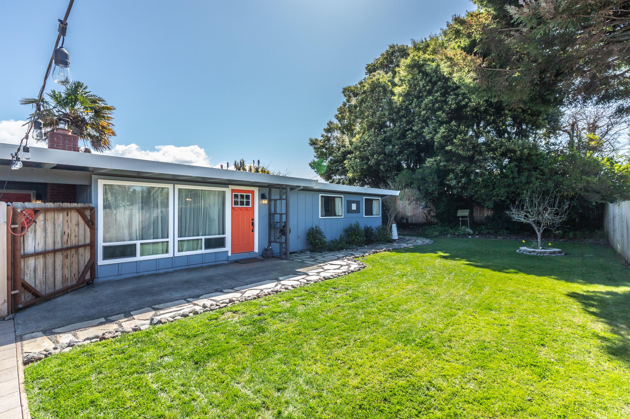 3372 Edgewood Road Myrtletown, CA 95501 - Photo 3 of 44 a front view of a house with a garden