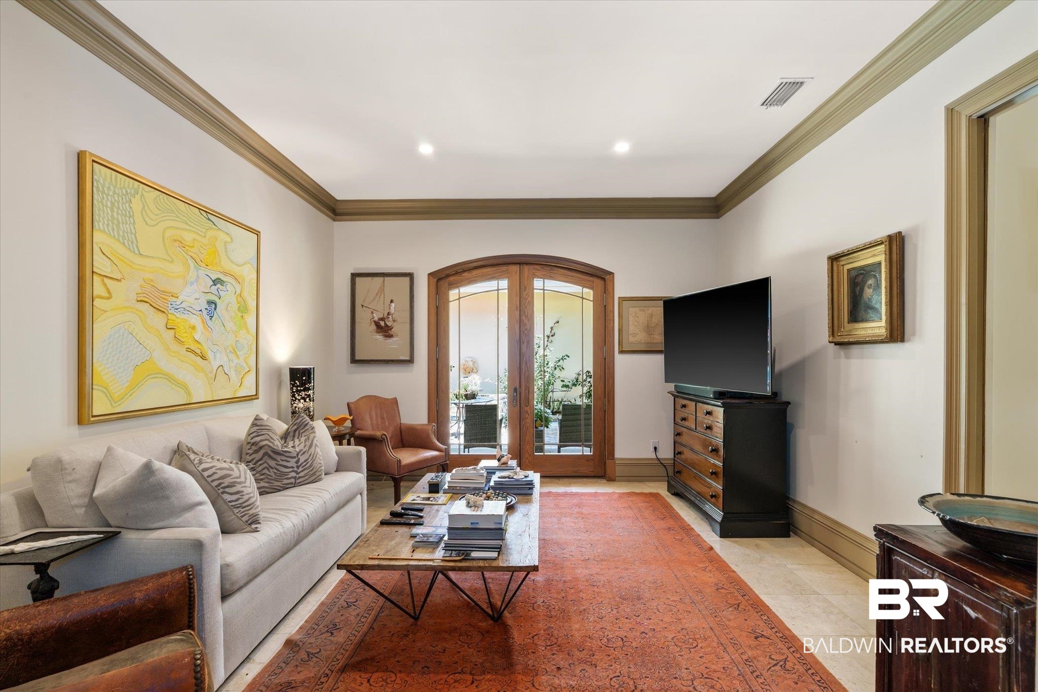 6341 Raintree Road Fairhope, AL 36532 - Photo 13 of 40 Tiled living room with ornamental molding and french doors