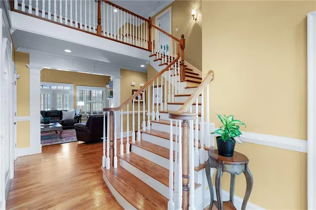 a view of an outdoor sitting area with furniture and umbrella
