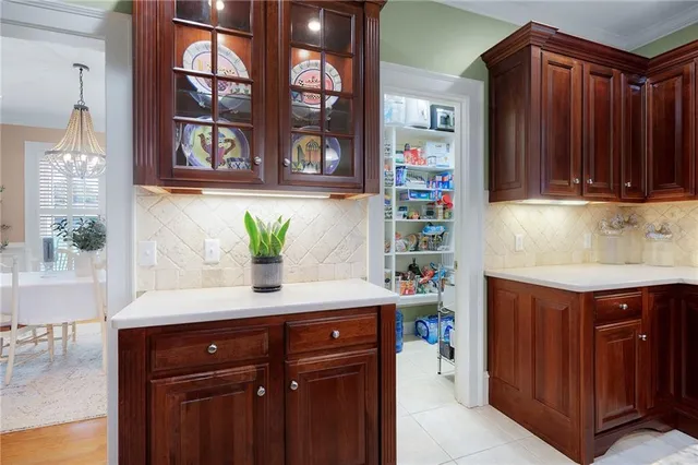 a bathroom with a sink vanity and a mirror