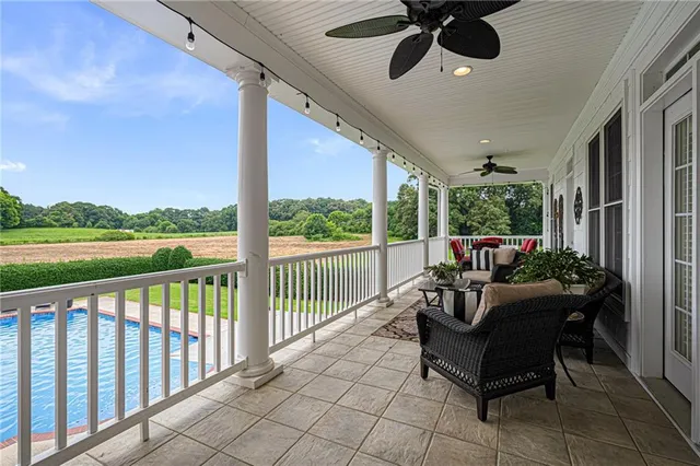 a bathroom with a sink toilet and mirror