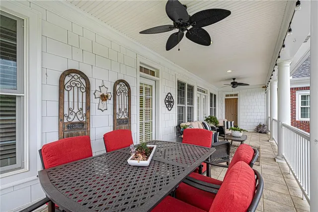 a view of yard with grass and a tree