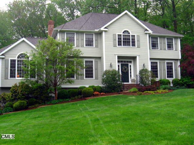 12 Blackhawk Road Trumbull, CT 06611 - Photo 1 of 1 a view of a yard in front of house