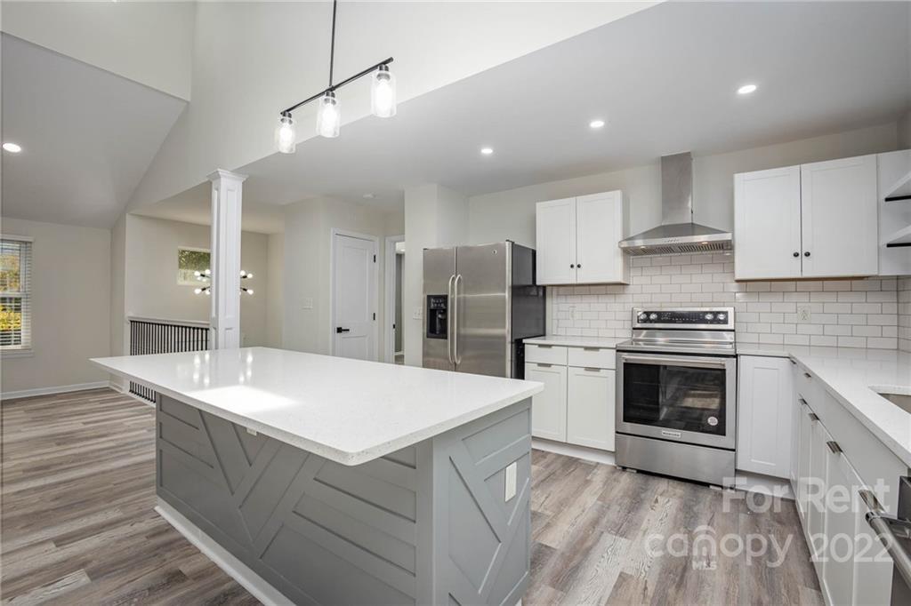 9501 Fairway Ridge Road Charlotte, NC 28277 - Photo 11 of 26 a kitchen with a sink stove and refrigerator