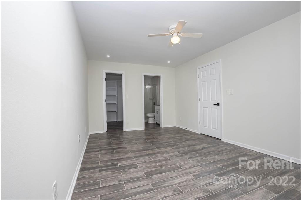 9501 Fairway Ridge Road Charlotte, NC 28277 - Photo 15 of 26 a view of an empty room with wooden floor