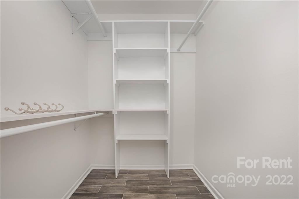 9501 Fairway Ridge Road Charlotte, NC 28277 - Photo 17 of 26 a view of an empty walk in closet
