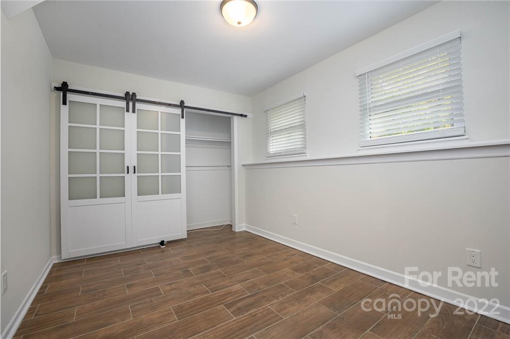 9501 Fairway Ridge Road Charlotte, NC 28277 - Photo 18 of 26 an empty room with windows