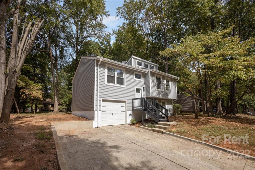 9501 Fairway Ridge Road Charlotte, NC 28277 - Photo 2 of 26 a view of a house with a yard