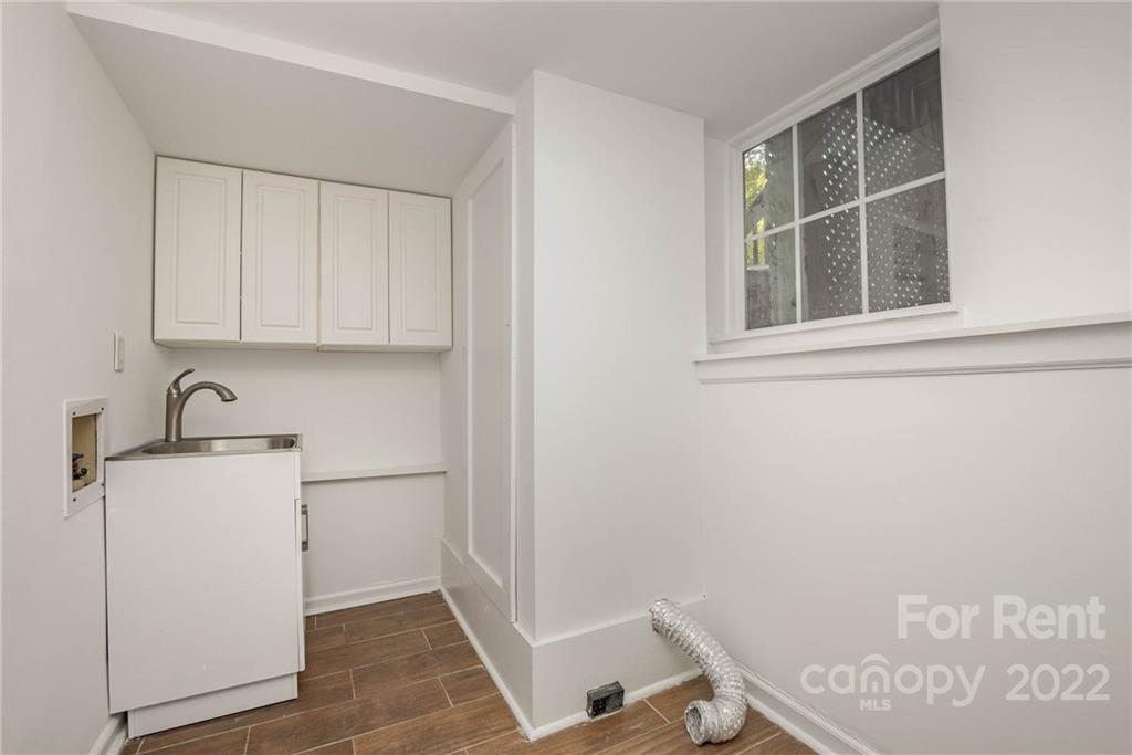 9501 Fairway Ridge Road Charlotte, NC 28277 - Photo 21 of 26 a view of storage and utility room with washer and dryer