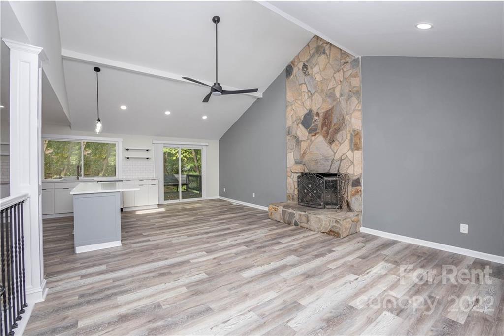 9501 Fairway Ridge Road Charlotte, NC 28277 - Photo 24 of 26 a view of an empty room with wooden floor and a window