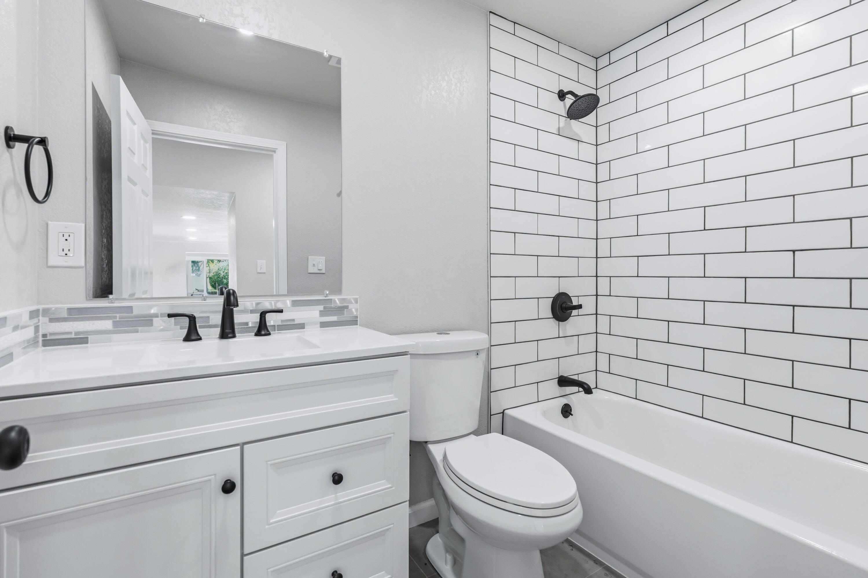 6673 Mountain View Drive Anderson, CA 96007 - Photo 11 of 42 a bathroom with a sink a toilet and shower