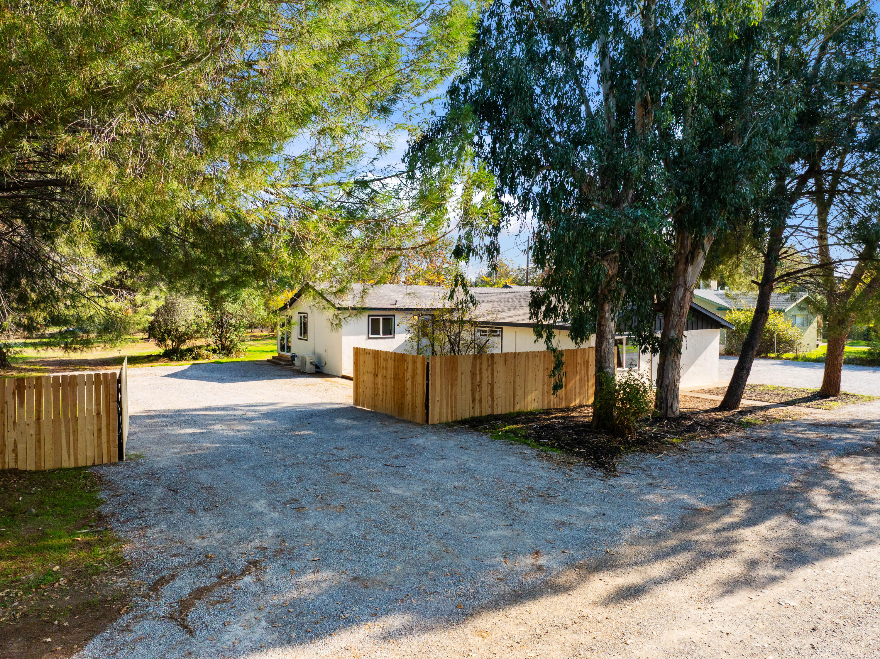 6673 Mountain View Drive Anderson, CA 96007 - Photo 2 of 42 a view of a yard with plants and trees