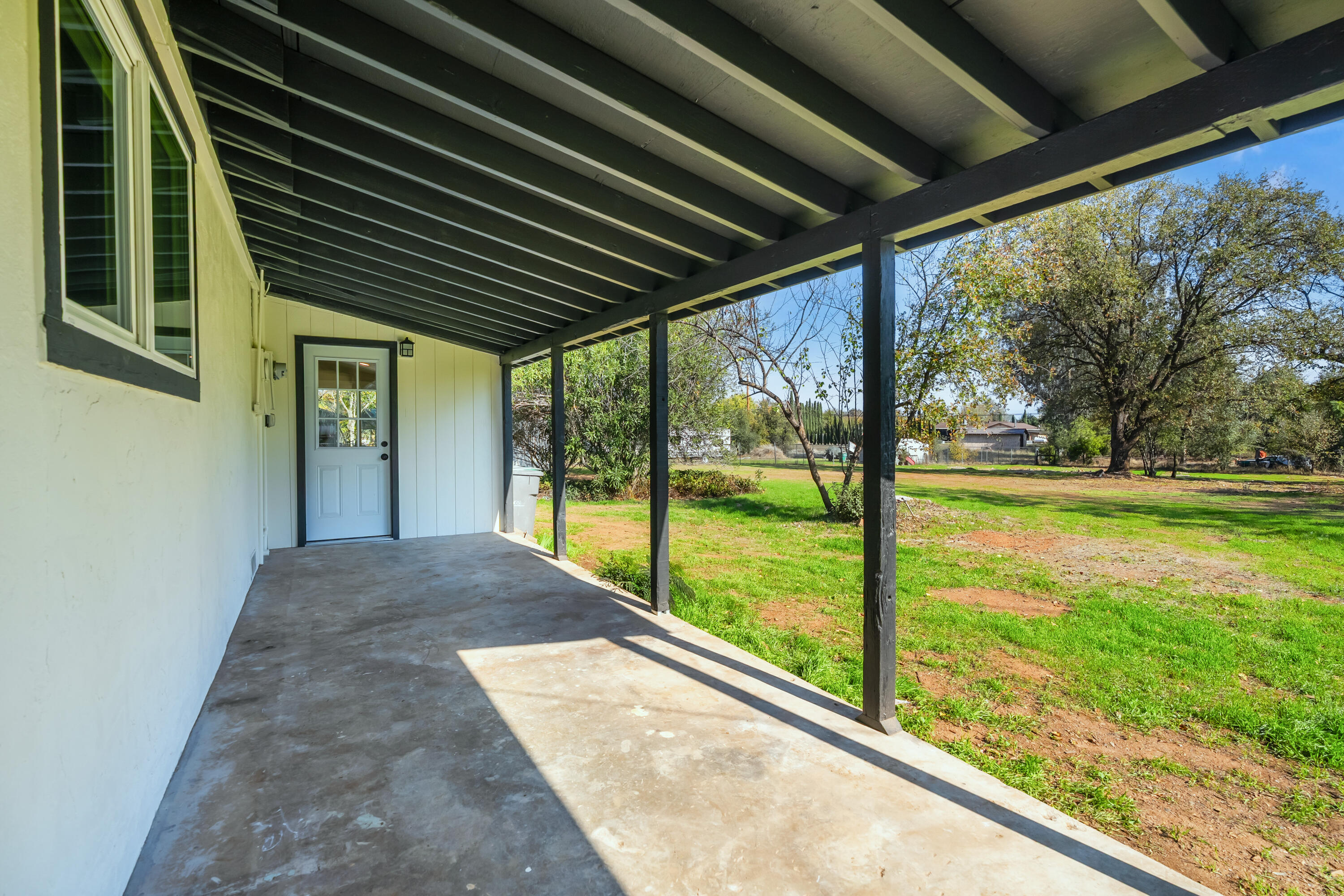 6673 Mountain View Drive Anderson, CA 96007 - Photo 33 of 42 a view of porch with a swimming pool