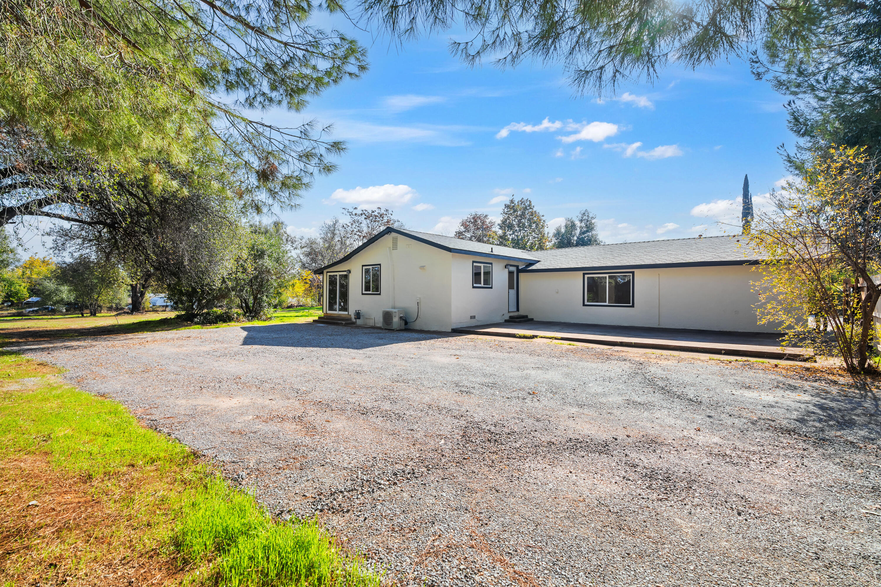 6673 Mountain View Drive Anderson, CA 96007 - Photo 35 of 42 a view of a house with backyard and tree