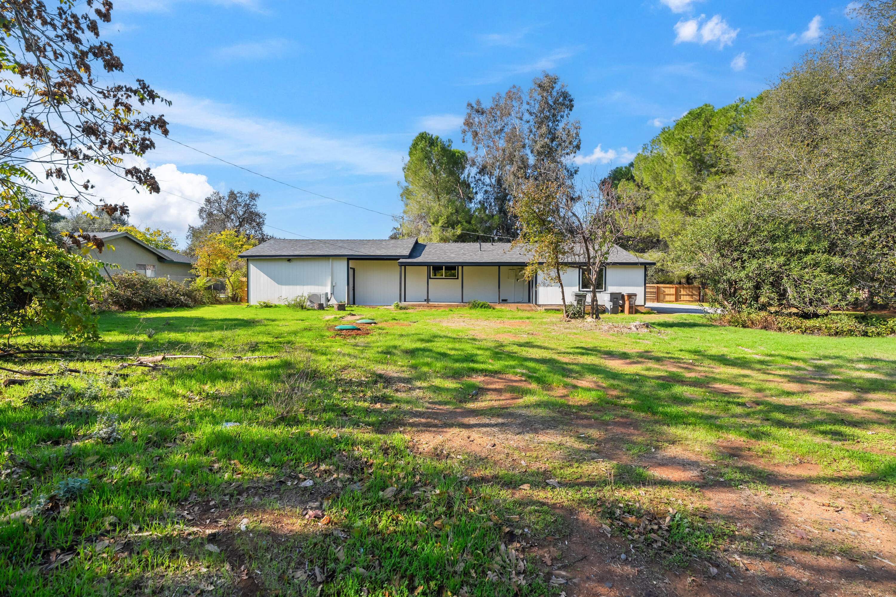 6673 Mountain View Drive Anderson, CA 96007 - Photo 38 of 42 a front view of a house with garden