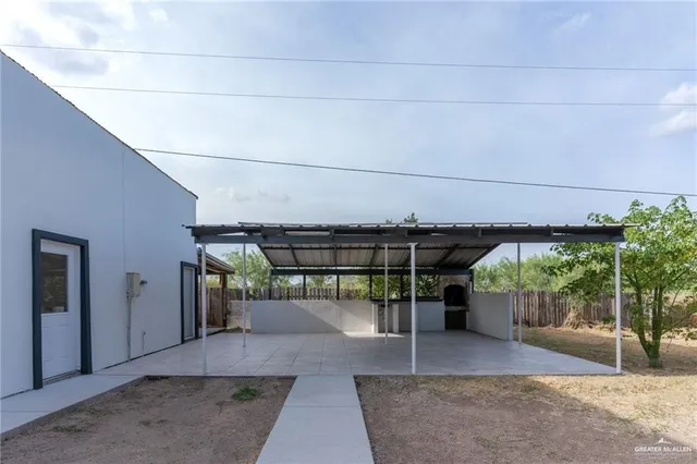 a view of a yard with an outdoor space