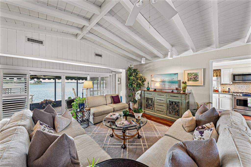 1075 Cody Cove Road Babson Park, FL 33827 - Photo 18 of 96 a living room with furniture and a fireplace