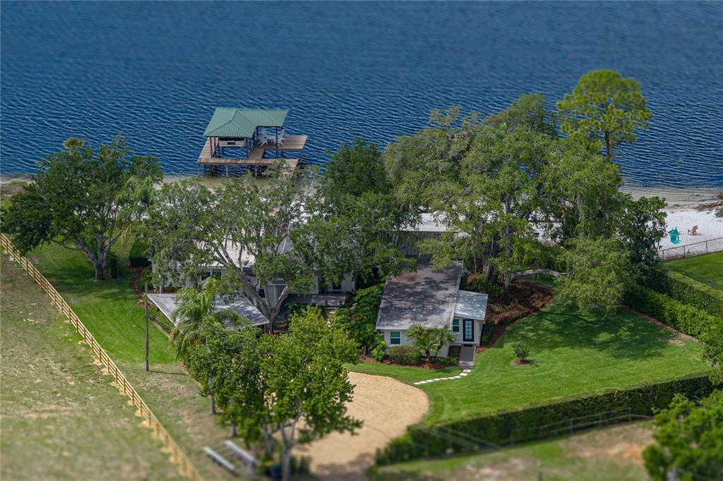 1075 Cody Cove Road Babson Park, FL 33827 - Photo 2 of 96 an aerial view of a house with a yard