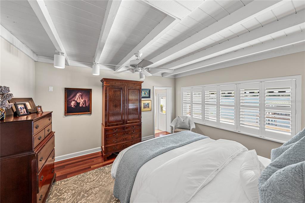 1075 Cody Cove Road Babson Park, FL 33827 - Photo 28 of 96 a bedroom with a bed and a large window