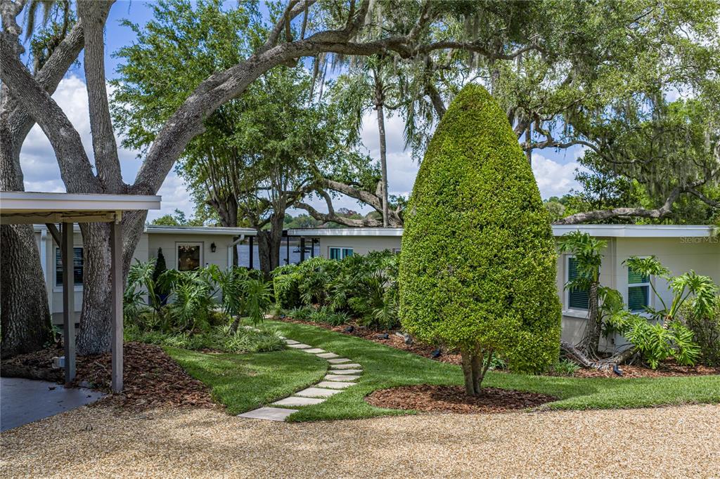 1075 Cody Cove Road Babson Park, FL 33827 - Photo 3 of 96 a front view of house with yard and green space