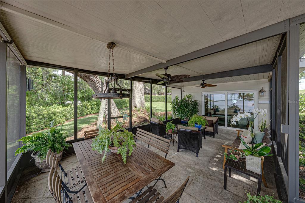 1075 Cody Cove Road Babson Park, FL 33827 - Photo 39 of 96 a view of a living room with furniture and garden view