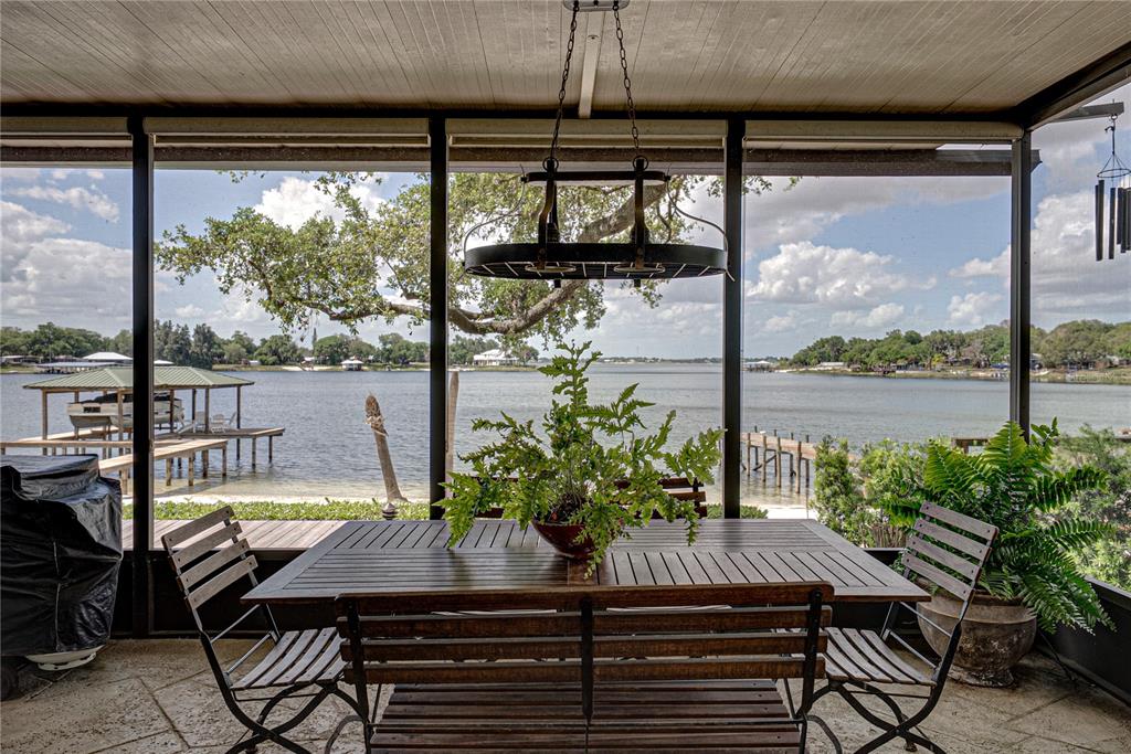 1075 Cody Cove Road Babson Park, FL 33827 - Photo 40 of 96 a view of a dining room with furniture window and outside view