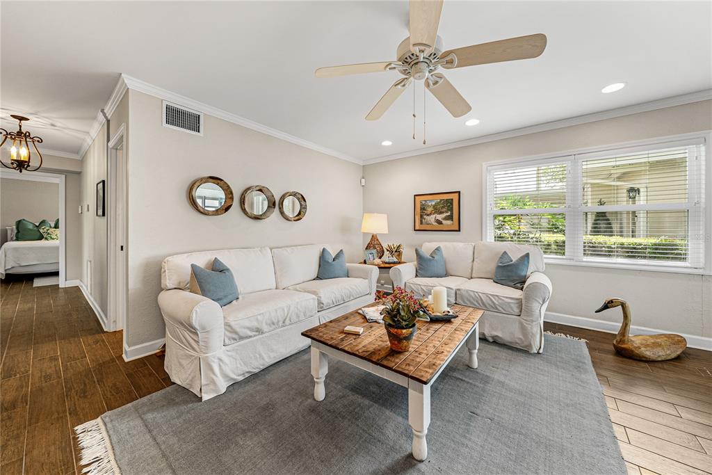 1075 Cody Cove Road Babson Park, FL 33827 - Photo 44 of 96 a living room with furniture and a large window