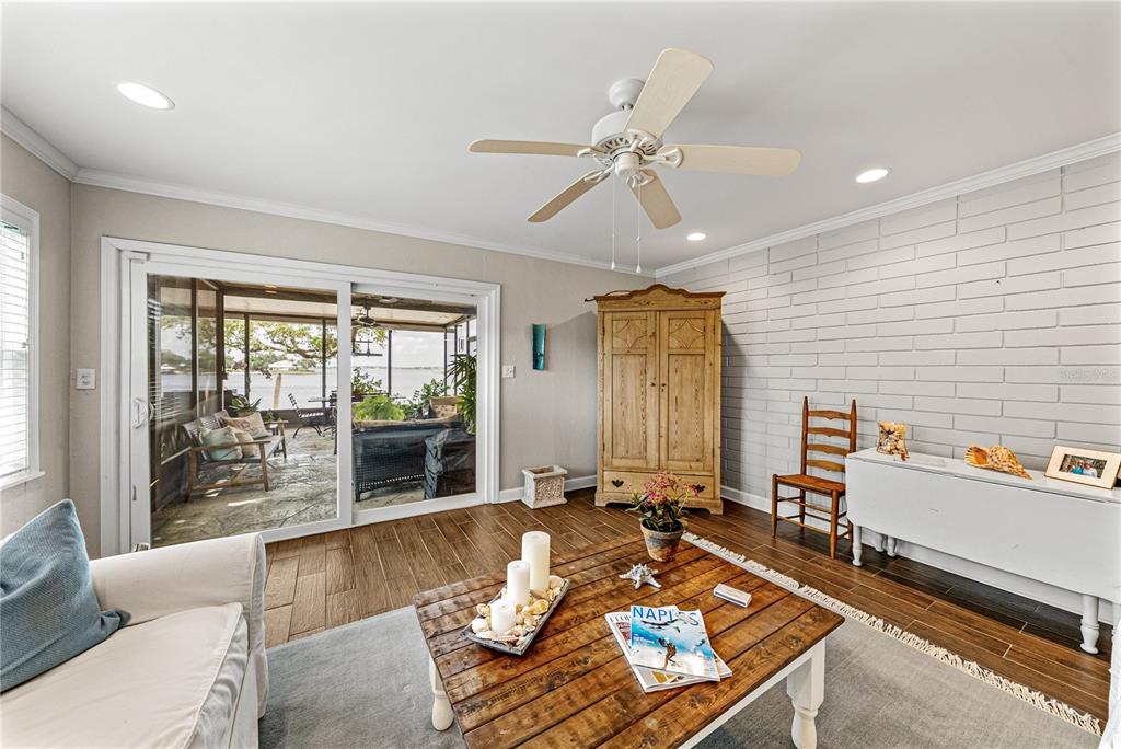 1075 Cody Cove Road Babson Park, FL 33827 - Photo 46 of 96 a living room with furniture and large windows