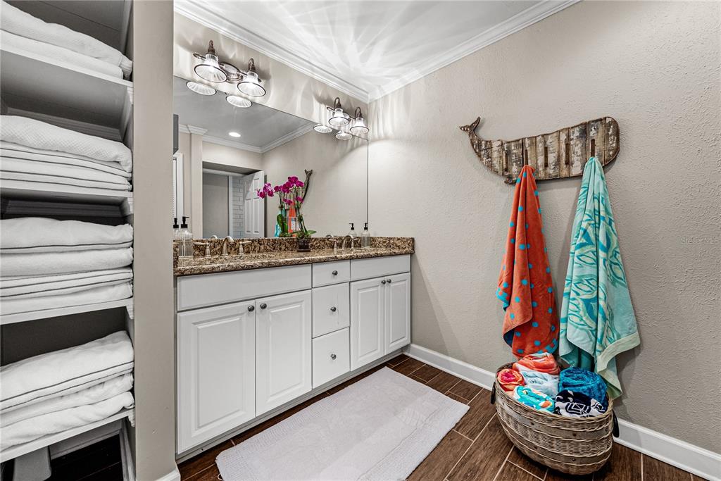 1075 Cody Cove Road Babson Park, FL 33827 - Photo 48 of 96 a bathroom with a sink and a mirror