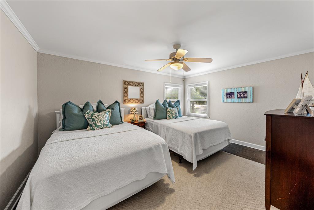 1075 Cody Cove Road Babson Park, FL 33827 - Photo 55 of 96 a bedroom with a bed painting on wall and a window