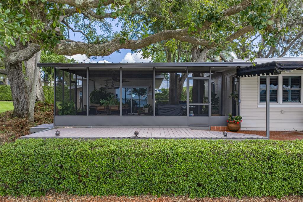 1075 Cody Cove Road Babson Park, FL 33827 - Photo 69 of 96 front view of a house with a yard table and chairs
