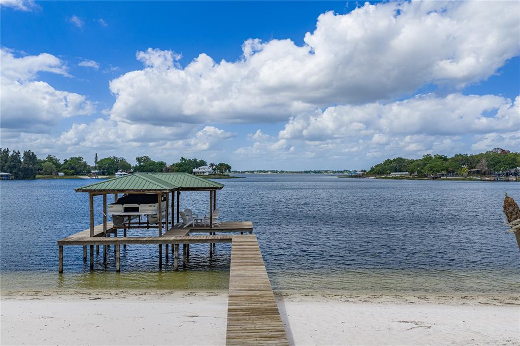 1075 Cody Cove Road Babson Park, FL 33827 - Photo 77 of 96 a view of a lake with a terrace