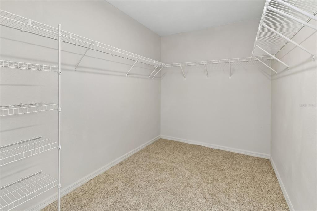 1192 Multiflora Loop Lutz, FL 33558 - Photo 20 of 32 a view of an empty walk in closet
