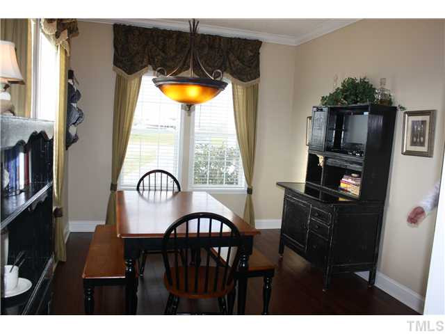 925 Quarterhorse Road Princeton, NC 27569 - Photo 12 of 21 FORMAL DINING ROOM WITH LAMINATED HARDWOOD FLOORS